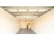 Spacious two car garage with epoxy flooring at 536 Lakehurst Nw Ave, Port Charlotte, FL 33952