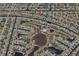 Aerial view of a residential neighborhood with canals and a community center at 619 Boundary Blvd, Rotonda West, FL 33947