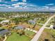 Aerial view of home with street running along side property with clearly marked property lines at 619 Boundary Blvd, Rotonda West, FL 33947