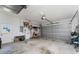 Spacious garage with door to outside, shelving, and garage door opener at 619 Boundary Blvd, Rotonda West, FL 33947