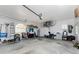 Spacious two-car garage with ample storage space, a window, and plenty of room for vehicles and tools at 619 Boundary Blvd, Rotonda West, FL 33947
