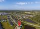 This aerial view showcases this property's ideal location within this desirable, lake-filled community at 6315 164Th E Ave, Parrish, FL 34219