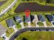 Aerial view highlighting location of property in a neighborhood near a pond at 6315 164Th E Ave, Parrish, FL 34219
