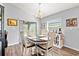 Cozy dining area with natural light, neutral paint, and stylish furnishings at 6315 164Th E Ave, Parrish, FL 34219