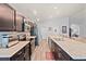 Modern kitchen boasts granite countertops, stainless steel appliances, and ample storage space at 6315 164Th E Ave, Parrish, FL 34219