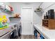 Well-organized laundry room with modern washer/dryer and ample counter space at 6315 164Th E Ave, Parrish, FL 34219