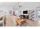 Cozy living room features an open floor plan, recessed lighting, and modern decor at 6315 164Th E Ave, Parrish, FL 34219