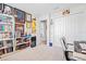 Bright office featuring a bookshelf and double door closet at 6315 164Th E Ave, Parrish, FL 34219