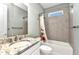 Cozy bathroom with tub and shower combo and a granite topped vanity at 7028 N Plum Tree, Punta Gorda, FL 33955