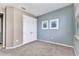Bedroom with neutral walls, two windows, carpet floors, artwork and recessed lighting at 7028 N Plum Tree, Punta Gorda, FL 33955