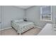 Cozy bedroom with carpet flooring and ample natural light at 7028 N Plum Tree, Punta Gorda, FL 33955