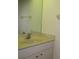 Neutral bathroom vanity with a bright sink and modern fixtures at 7500 Ligustrum, Punta Gorda, FL 33955