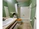 Bathroom with shower and bathtub combination, updated vanity and neutral paint at 1081 E Corktree Cir, Port Charlotte, FL 33952