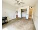 Empty bedroom with attached closet space and view to en-suite bathroom at 1081 E Corktree Cir, Port Charlotte, FL 33952