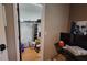 Walk-in closet with white door frame and custom shelving at 131 Spring Lake Nw Blvd, Port Charlotte, FL 33952