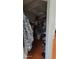 Walk-in closet with ample hanging space, shelving and storage solutions for organization at 131 Spring Lake Nw Blvd, Port Charlotte, FL 33952