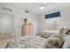 Bright bedroom with matching twin beds, stylish furnishings, and plenty of natural light at 14281 Heritage Landing Blvd # 1418, Punta Gorda, FL 33955