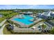 Aerial view of the large community pool and surrounding amenities at 14281 Heritage Landing Blvd # 1418, Punta Gorda, FL 33955