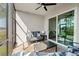 Relaxing screened lanai with comfortable seating and a peaceful view of the lake at 14281 Heritage Landing Blvd # 1418, Punta Gorda, FL 33955