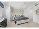 Spacious primary bedroom features a luxurious bed, stylish decor, and inviting ambiance at 14281 Heritage Landing Blvd # 1418, Punta Gorda, FL 33955