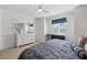 Bedroom with a decorative bureau and a window that brings in natural light at 14281 Heritage Landing Blvd # 1418, Punta Gorda, FL 33955