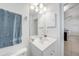 Cozy bathroom with neutral decor, under-sink storage, and integrated sink at 15538 Aqua Cir, Port Charlotte, FL 33981
