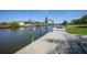 Waterfront dock featuring boat lift, offering great outdoor space at 15538 Aqua Cir, Port Charlotte, FL 33981