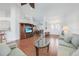 Open-concept living room and dining area with tile floors and view of the entry doors at 15538 Aqua Cir, Port Charlotte, FL 33981