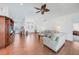 Bright living room with high ceilings, tile floors, and double-door entry at 15538 Aqua Cir, Port Charlotte, FL 33981