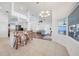 Open floor plan features a living room and adjacent kitchen with counter seating at 15538 Aqua Cir, Port Charlotte, FL 33981