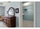 Bedroom with dresser and walk-in closet with wire shelving for ample storage at 2001 Bal Harbor Blvd # 2312, Punta Gorda, FL 33950