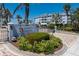 Community entrance featuring lush landscaping, elegant signage, and a secure gated entry at 2001 Bal Harbor Blvd # 2312, Punta Gorda, FL 33950
