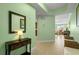 Bright entryway with a hall table, mirror, and a peek into the living space at 2001 Bal Harbor Blvd # 2312, Punta Gorda, FL 33950