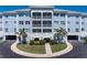 Charming building exterior with manicured landscaping and inviting entryway at 2001 Bal Harbor Blvd # 2312, Punta Gorda, FL 33950