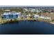 Beautiful exterior view of the building with a dock, community pool, and waterfront access at 2001 Bal Harbor Blvd # 2312, Punta Gorda, FL 33950