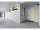 Well-maintained hallway with neutral tones and a unit entrance at 2001 Bal Harbor Blvd # 2312, Punta Gorda, FL 33950