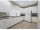 Kitchen area features white cabinets, ample counter space, and modern appliances at 2001 Bal Harbor Blvd # 2312, Punta Gorda, FL 33950