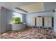 Inviting lobby area with colorful flowers and a place to pick up your mail at 2001 Bal Harbor Blvd # 2312, Punta Gorda, FL 33950