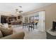 This open floorplan seamlessly connects the living room, dining area, and kitchen, perfect for entertaining at 21168 Quesada Ave, Port Charlotte, FL 33952