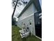 Exterior home's utility infrastructure, including pipes, electrical panels, and the pool pump at 22223 Seyburn Ter, Port Charlotte, FL 33954