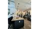 Spacious kitchen with an island, modern appliances, and stylish bar seating at 22223 Seyburn Ter, Port Charlotte, FL 33954