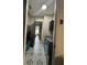 Well-lit laundry area with stylish patterned tile, newer appliances, and direct access to the home's interior at 22223 Seyburn Ter, Port Charlotte, FL 33954