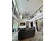 The living room boasts soaring ceilings, clerestory windows, and a contemporary loft design at 22223 Seyburn Ter, Port Charlotte, FL 33954