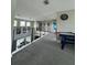 Spacious loft area with game table, offering a versatile living space at 22223 Seyburn Ter, Port Charlotte, FL 33954