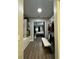 Spacious walk-in closet with custom shelving and a convenient bench; direct access to the main bedroom at 22223 Seyburn Ter, Port Charlotte, FL 33954