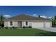 Charming single-story home with a manicured lawn, three-car garage, and decorative shutters at 2518 Hemet St, North Port, FL 34288