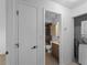This full bathroom features a shower and vanity at 25225 Rampart Blvd # 205, Punta Gorda, FL 33983