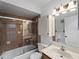 Bathroom features a shower-tub combination with tile surround and a vanity with countertop at 25225 Rampart Blvd # 205, Punta Gorda, FL 33983