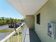 Exterior shot of the unit showing the balcony and the parking lot at 25225 Rampart Blvd # 205, Punta Gorda, FL 33983