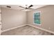 Bright bedroom with wood-look flooring and a window with natural light at 27260 Porto Nacional Dr, Punta Gorda, FL 33983